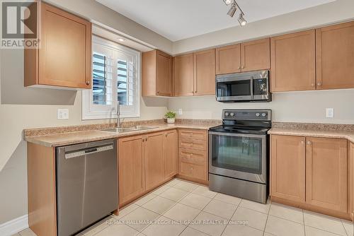 414 Greenwood Drive, Essa, ON - Indoor Photo Showing Kitchen With Double Sink