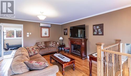 8 Cobra Place, Conception Bay South, NL - Indoor Photo Showing Living Room With Fireplace