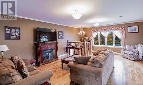 8 Cobra Place, Conception Bay South, NL - Indoor Photo Showing Living Room With Fireplace