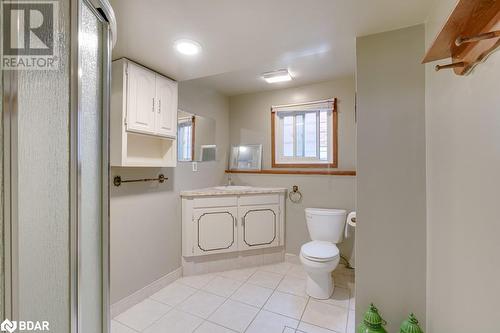 Bathroom featuring tile patterned flooring, vanity, and toilet - 47 Westfield Drive, St. Catharines, ON - Indoor Photo Showing Bathroom