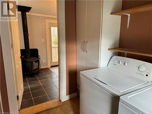 Mudroom with laundry off side entrance - 941 20Th Street W, Georgian Bluffs, ON - Indoor Photo Showing Laundry Room