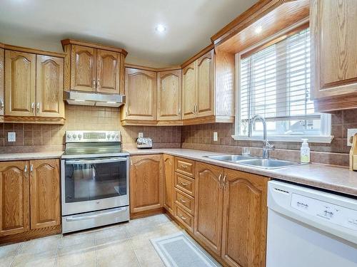 Cuisine - 365 Rue Hector, Laval (Fabreville), QC - Indoor Photo Showing Kitchen With Double Sink