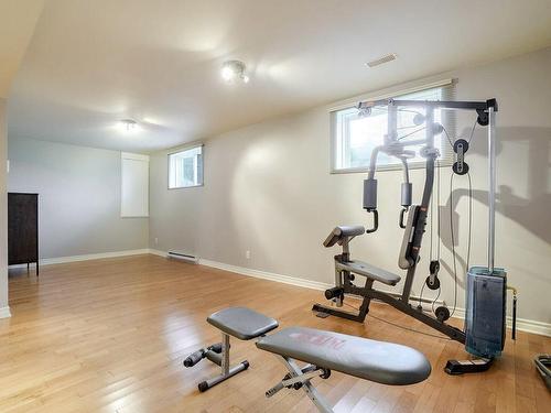 Salle familiale - 365 Rue Hector, Laval (Fabreville), QC - Indoor Photo Showing Gym Room