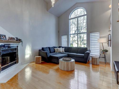 Salon - 23 111E Avenue O., Blainville, QC - Indoor Photo Showing Living Room With Fireplace