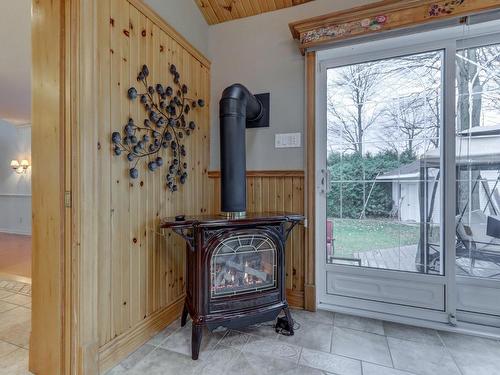 Solarium - 23 111E Avenue O., Blainville, QC - Indoor Photo Showing Other Room With Fireplace