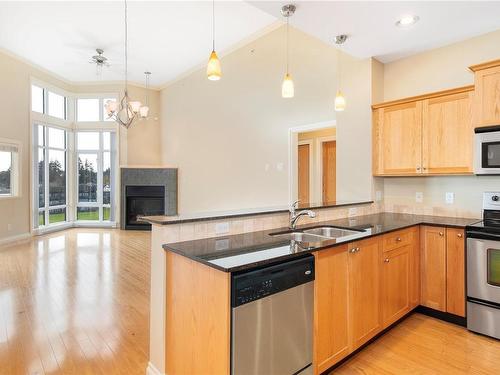 403-2676 Island Hwy South, Campbell River, BC - Indoor Photo Showing Kitchen With Fireplace With Double Sink