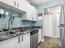 210-4701 Uplands Dr, Nanaimo, BC  - Indoor Photo Showing Kitchen With Double Sink 