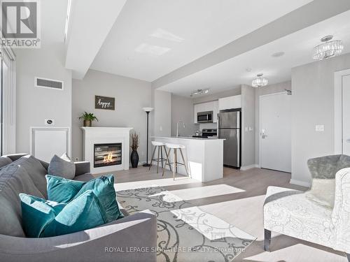 512 - 55 East Liberty, Toronto, ON - Indoor Photo Showing Living Room With Fireplace