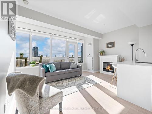 512 - 55 East Liberty, Toronto, ON - Indoor Photo Showing Living Room With Fireplace