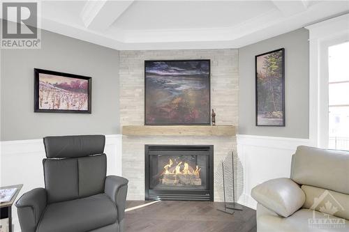 1598 Shauna Crescent, Ottawa, ON - Indoor Photo Showing Living Room With Fireplace