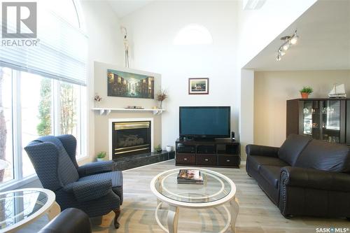 5007 Strathcona Avenue, Corman Park Rm No. 344, SK - Indoor Photo Showing Living Room With Fireplace