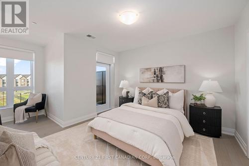 Primary with 2nd balcony - 312 - 1560 Upper West Avenue, London, ON - Indoor Photo Showing Bedroom