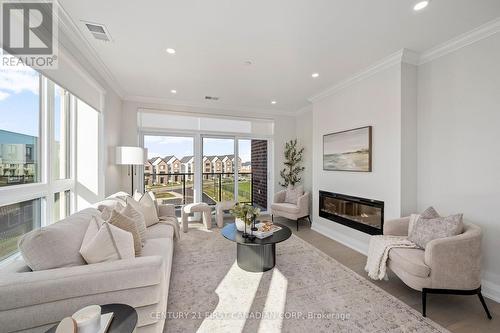 312 - 1560 Upper West Avenue, London, ON - Indoor Photo Showing Living Room With Fireplace