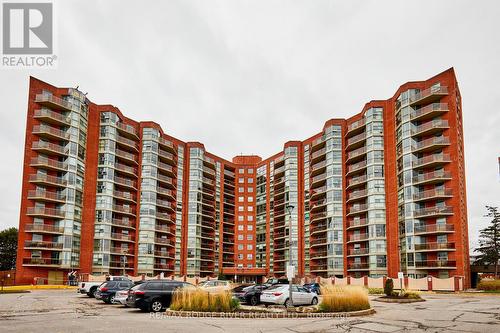 716 - 20 Dean Park Road, Toronto, ON - Outdoor With Balcony With Facade