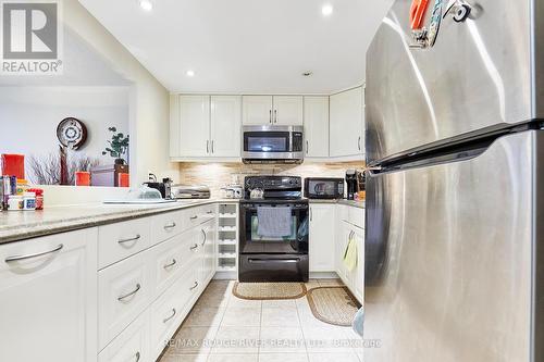 716 - 20 Dean Park Road, Toronto, ON - Indoor Photo Showing Kitchen