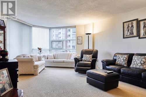 716 - 20 Dean Park Road, Toronto, ON - Indoor Photo Showing Living Room