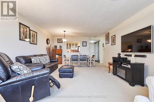 716 - 20 Dean Park Road, Toronto, ON - Indoor Photo Showing Living Room