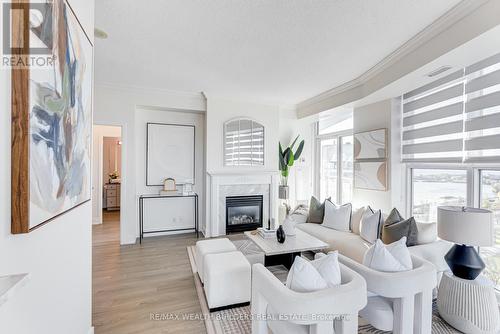 1105 - 2067 Lake Shore Boulevard W, Toronto, ON - Indoor Photo Showing Living Room With Fireplace