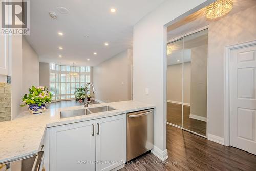 108 - 2511 Lakeshore Road W, Oakville, ON - Indoor Photo Showing Kitchen With Double Sink