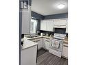 7627 Moncton Crescent, Prince George, BC  - Indoor Photo Showing Kitchen With Double Sink 