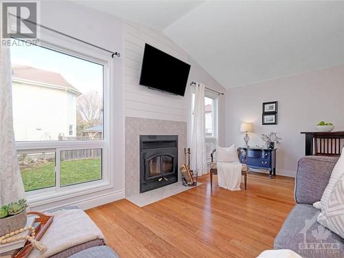 53 Saddlehorn Crescent, Kanata, ON - Indoor Photo Showing Living Room With Fireplace