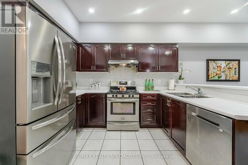 7565 Doverwood Drive, Mississauga, ON - Indoor Photo Showing Kitchen With Stainless Steel Kitchen With Double Sink