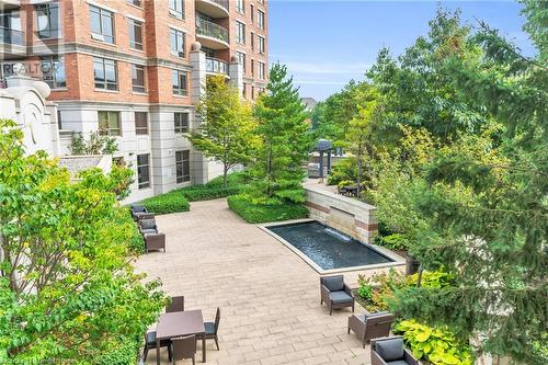 View of community with a patio area - 2379 Central Park Drive Unit# 206, Oakville, ON - Outdoor