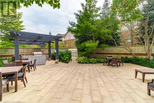 View of patio / terrace with a pergola - 2379 Central Park Drive Unit# 206, Oakville, ON - Outdoor With Deck Patio Veranda