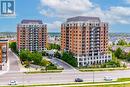 View of property - 2379 Central Park Drive Unit# 206, Oakville, ON  - Outdoor With Balcony With Facade 