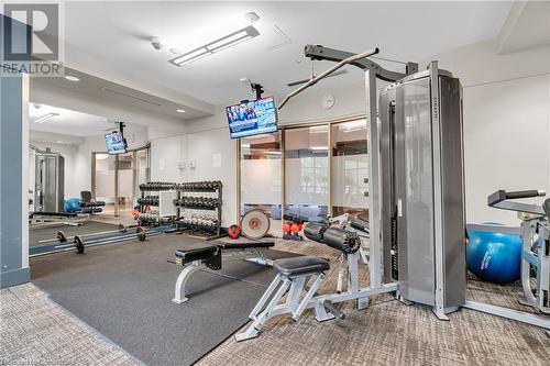 View of workout area - 2379 Central Park Drive Unit# 206, Oakville, ON - Indoor Photo Showing Gym Room