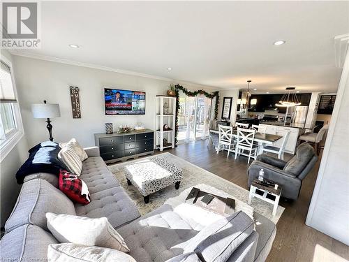 Another angle of Living Room, Dining Area, Patio doors, kitchen in the background - 1 Maple Lane, Tillsonburg, ON - Indoor Photo Showing Living Room