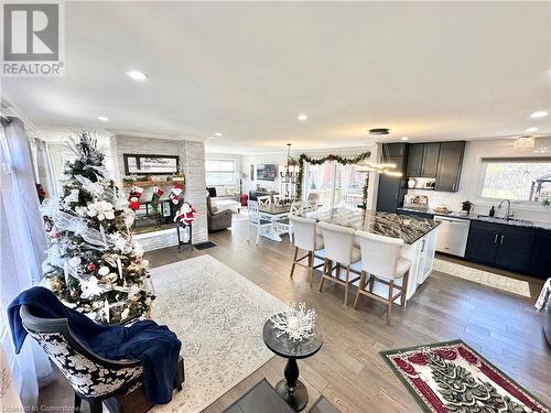 From the front foyer - showing the kitchen - dining area, living room and gas fireplace - 1 Maple Lane, Tillsonburg, ON - Indoor