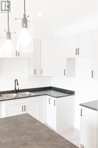 62 Evans Street, Prince Edward County, ON - Indoor Photo Showing Kitchen With Double Sink