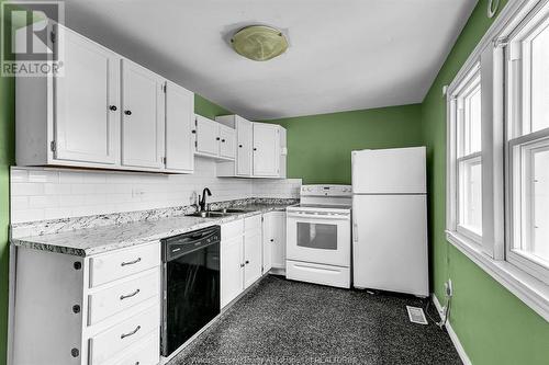 2206 Janette, Windsor, ON - Indoor Photo Showing Kitchen With Double Sink