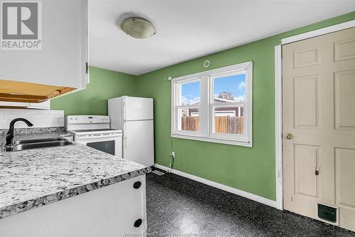 2206 Janette, Windsor, ON - Indoor Photo Showing Kitchen With Double Sink