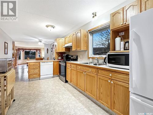 402 4Th Street W, Fort Qu'Appelle, SK - Indoor Photo Showing Kitchen With Double Sink