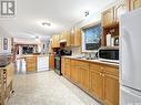 402 4Th Street W, Fort Qu'Appelle, SK  - Indoor Photo Showing Kitchen With Double Sink 