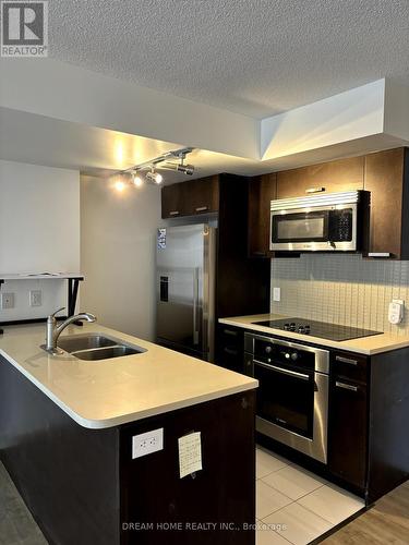 614 - 295 Adelaide Street W, Toronto, ON - Indoor Photo Showing Kitchen With Double Sink