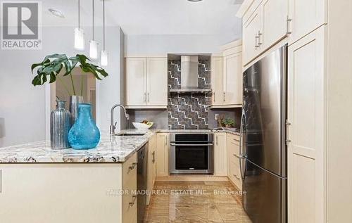 125 - 109 Front Street E, Toronto, ON - Indoor Photo Showing Kitchen With Upgraded Kitchen