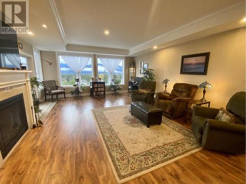 18 4022 Yeo Street, Terrace, BC - Indoor Photo Showing Living Room With Fireplace