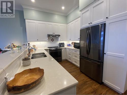 18 4022 Yeo Street, Terrace, BC - Indoor Photo Showing Kitchen With Double Sink