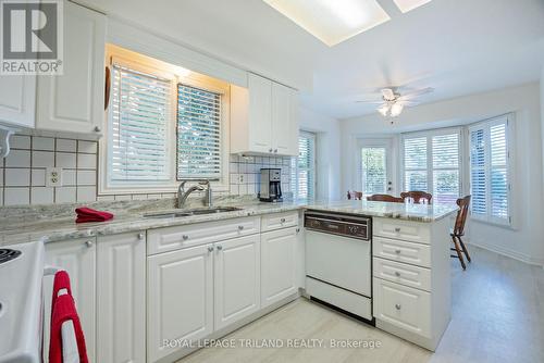 19 - 65 Fiddlers Green Road, London, ON - Indoor Photo Showing Kitchen With Double Sink