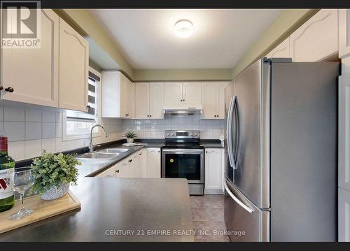 4 Slessor Lane, Brampton, ON - Indoor Photo Showing Kitchen With Double Sink