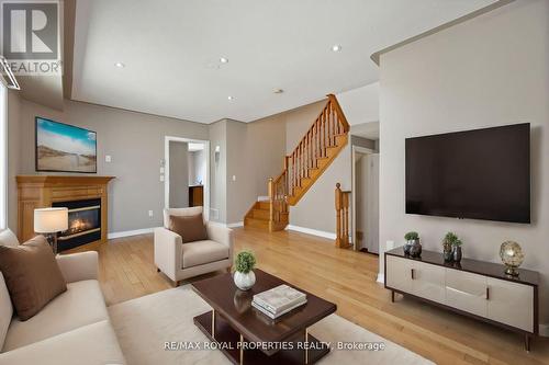 7173 Village Walk, Mississauga, ON - Indoor Photo Showing Living Room With Fireplace