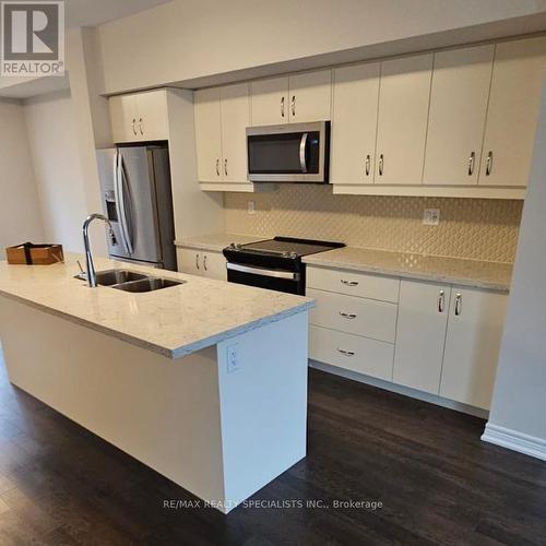 36 Folcroft Street, Brampton, ON - Indoor Photo Showing Kitchen With Double Sink