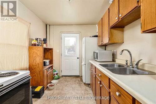 1085 3Rd A Avenue E, Owen Sound, ON - Indoor Photo Showing Kitchen With Double Sink