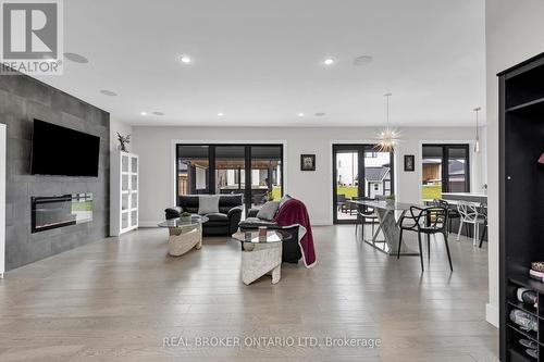 Integrated Sound System on Main - 3495 Grand Oak Cross, London, ON - Indoor Photo Showing Living Room With Fireplace