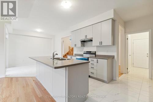 27 Prudhoe Terrace, Barrie, ON - Indoor Photo Showing Kitchen With Double Sink