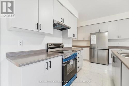 27 Prudhoe Terrace, Barrie, ON - Indoor Photo Showing Kitchen With Double Sink