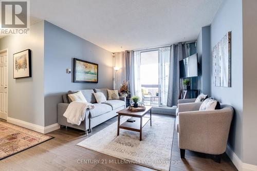 1120 - 1625 Bloor Street E, Mississauga, ON - Indoor Photo Showing Living Room